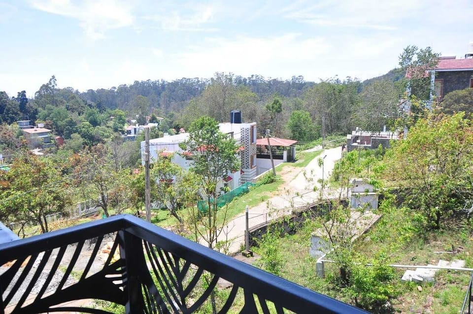 Deluxe Room, Garden View | Terrace/patio