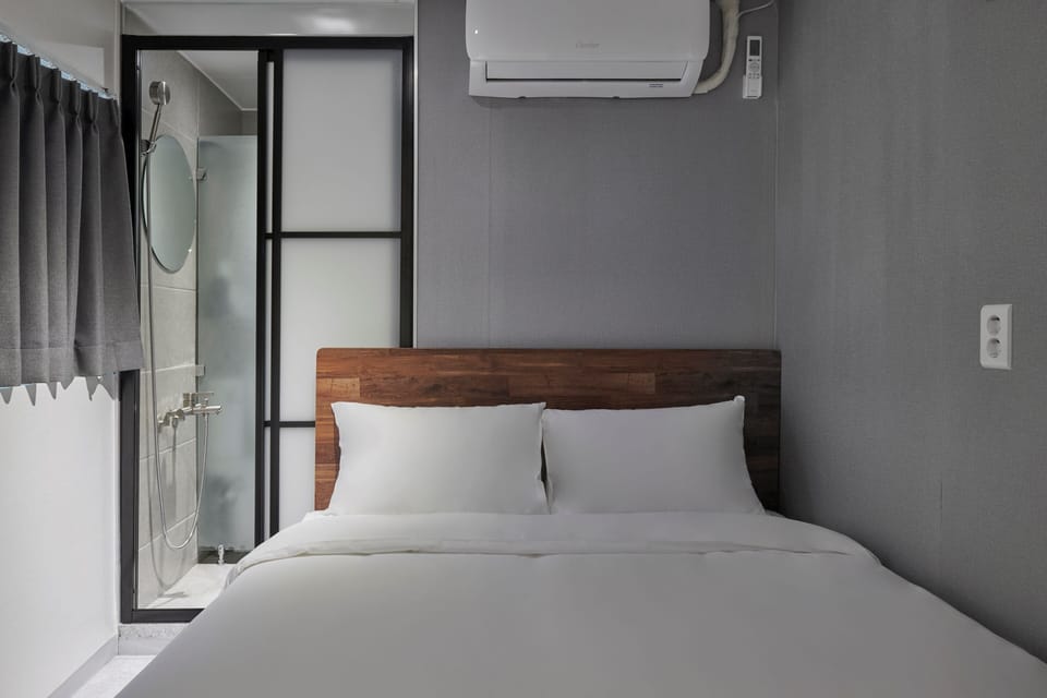 Family Twin Room | Desk, blackout drapes, iron/ironing board, free WiFi