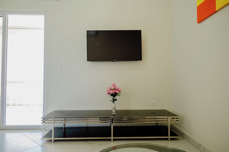 Apartment, 4 Bedrooms, Balcony, Garden View | Living room