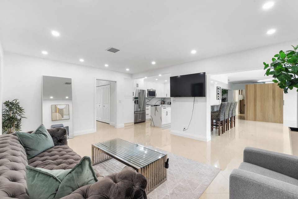Living Room with a 60" HDTV with Hulu for movie nights and entertainment