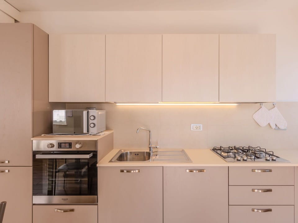 Kitchen, Kitchen Appliance, Major Appliance, Countertop, Cabinetry, Wood, Interior Design, Kitchen Stove, Home Appliance, Stove