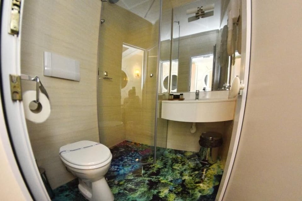 Premium Room, Balcony, Partial Sea View | Bathroom | Shower, hair dryer, towels, soap