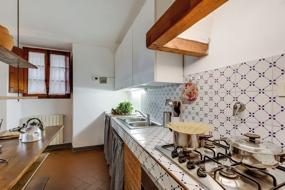 Family Apartment, 1 Bedroom, Fireplace, Mountainside (Relaxing Tuscan Terrazza near) | Private kitchen | Fridge, oven, stovetop, coffee/tea maker