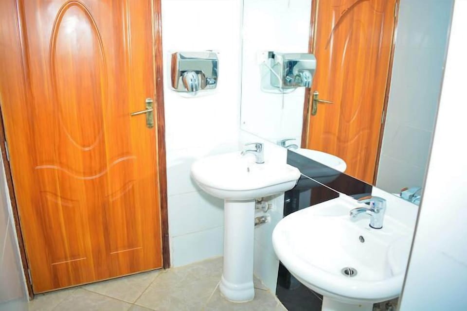 Shower, slippers, towels, soap