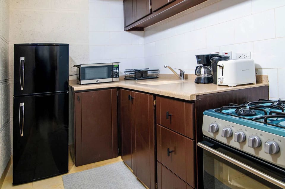 Whip up a quick meal in your kitchenette. Fridge, microwave, and stovetop included.