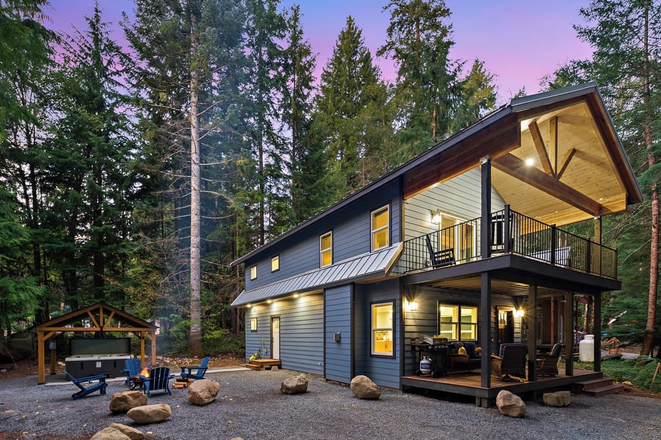 Located in a resort community, outside find EV charging, fire pit, and hot tub.