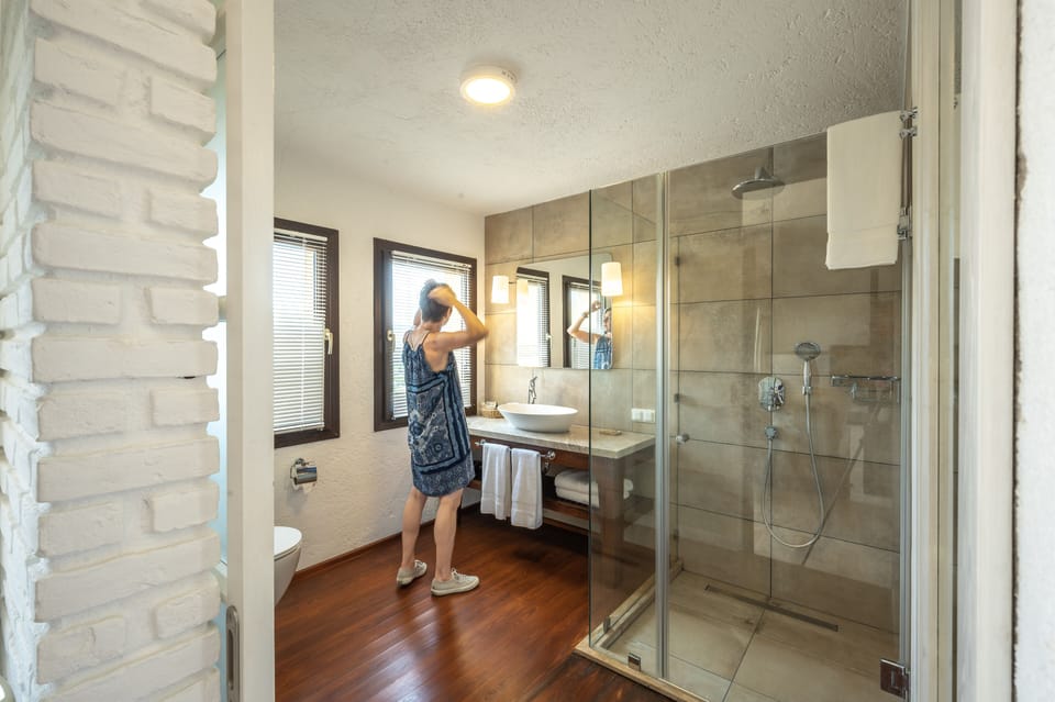Passionate Room | Bathroom | Shower, designer toiletries, hair dryer, bathrobes