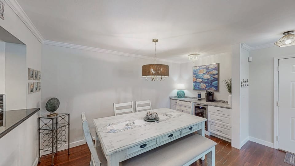 Gather around the exquisite dining table, with seating for 6, and savor delicious meals while sharing your favorite experiences from the day's adventures.