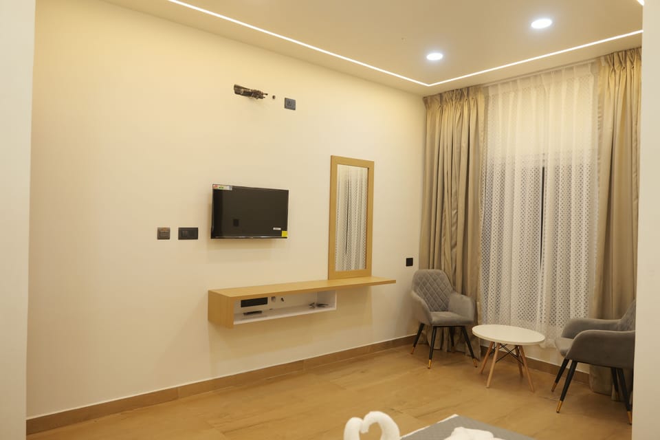 Executive Double Room, Valley View | Desk, laptop workspace, blackout drapes, iron/ironing board
