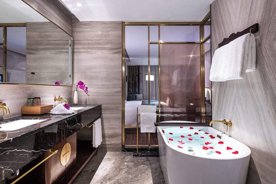 Deluxe Double Room, City View | Bathroom | Hair dryer, slippers, bidet, towels