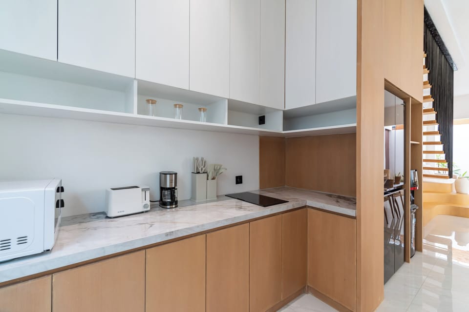 Deluxe Villa, Pool View | Private kitchen | Fridge, microwave, stovetop, electric kettle