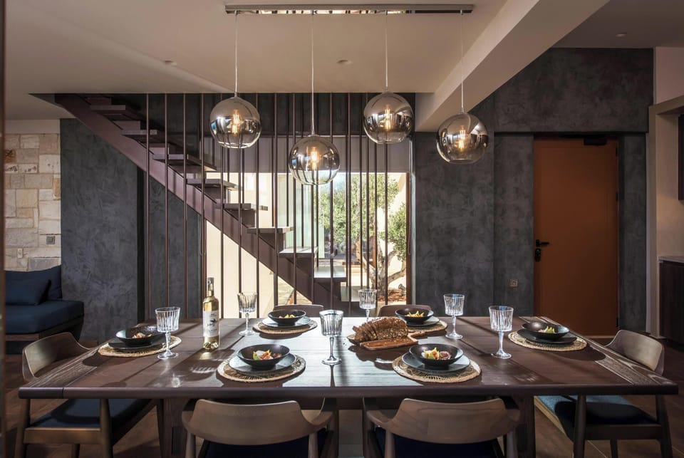 The dining table comfortably seats up to 6 guests.