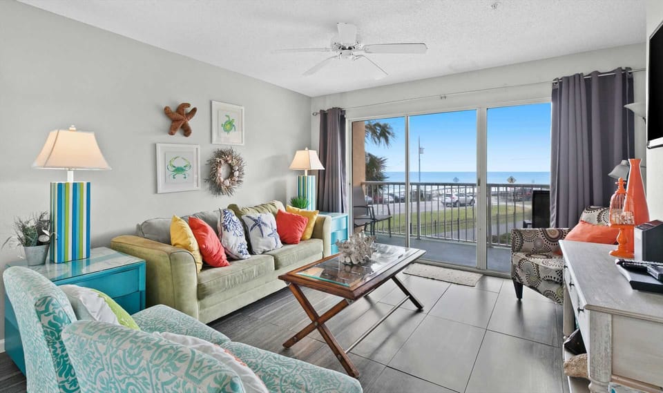 Relax in a sunlit living room where the Gulf is always part of the view.