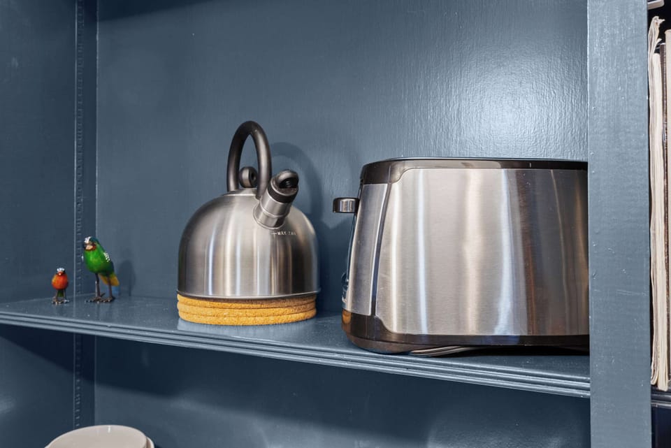 Kitchen:  Bright and functional space to whip up your favorite dishes.