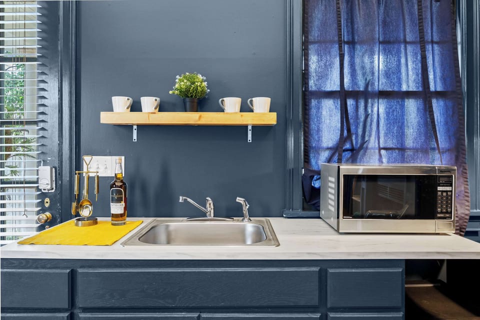 Kitchen:  Bright and functional space to whip up your favorite dishes.