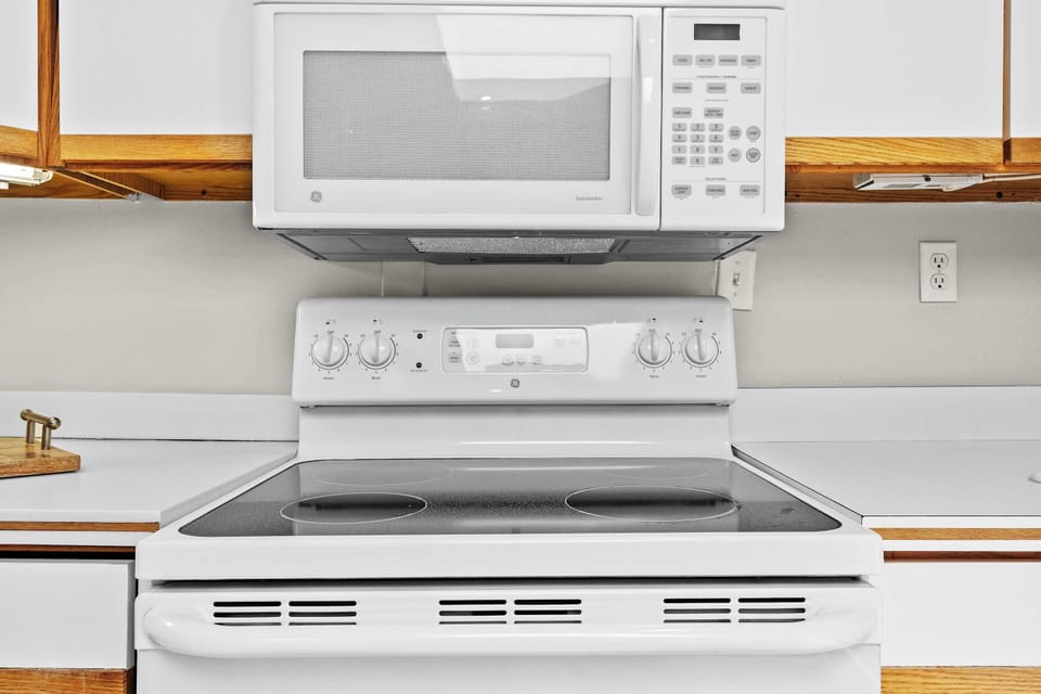 Kitchen:  Bright and functional space to whip up your favorite dishes.