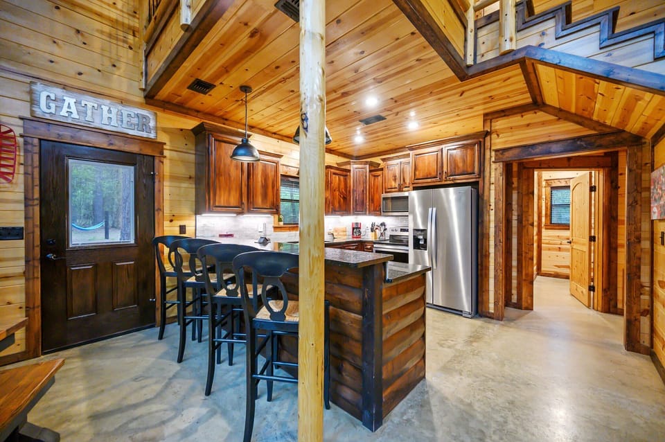 The warm, open kitchen offers ample space & all the comforts of home