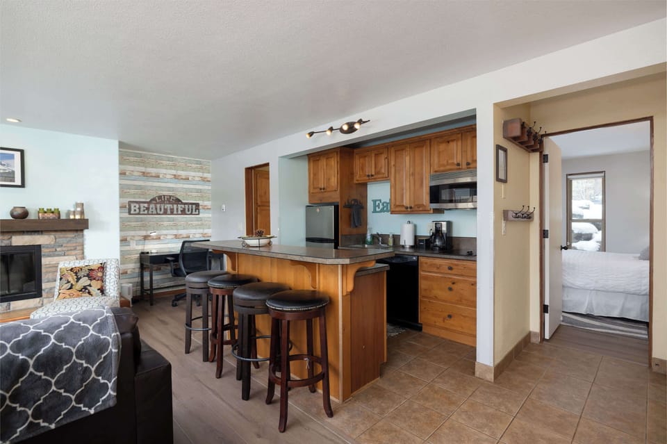 The inviting open kitchen offers ample space & all the comforts of home