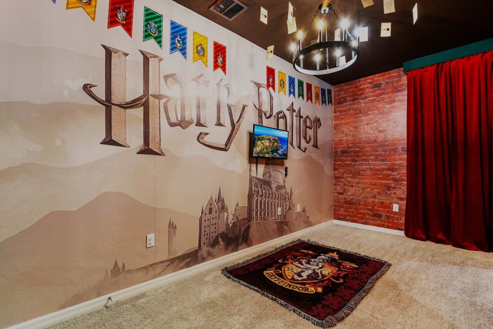 Step into Hogwarts with bold murals, house banners, and magical movie night vibes
