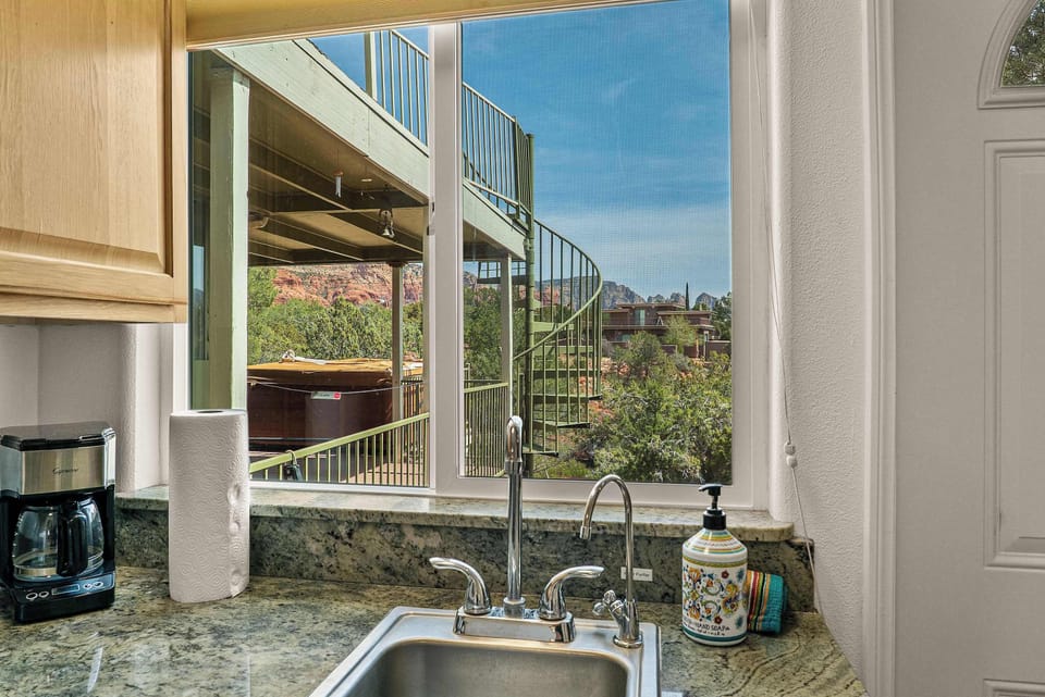 Modern kitchenette features all the essentials for a comfortable stay.