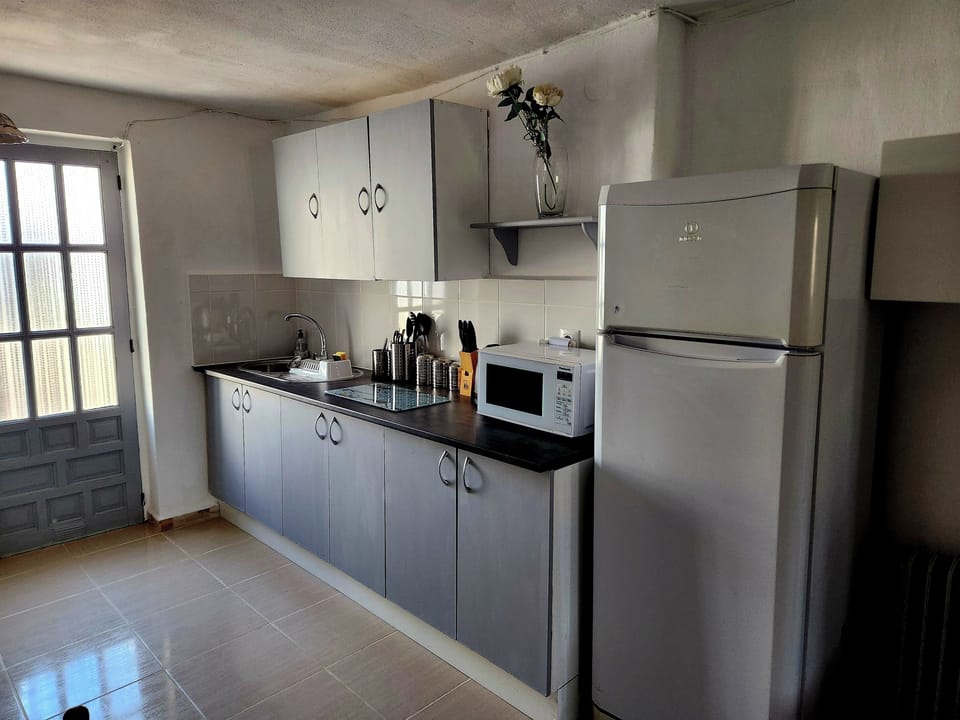 Apartment | Private kitchen | Fridge, microwave, oven, stovetop