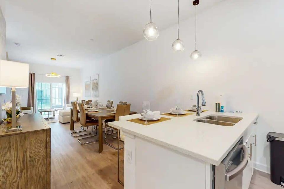 Gather around a spacious dining table, perfect for enjoying meals and making memories with loved ones!