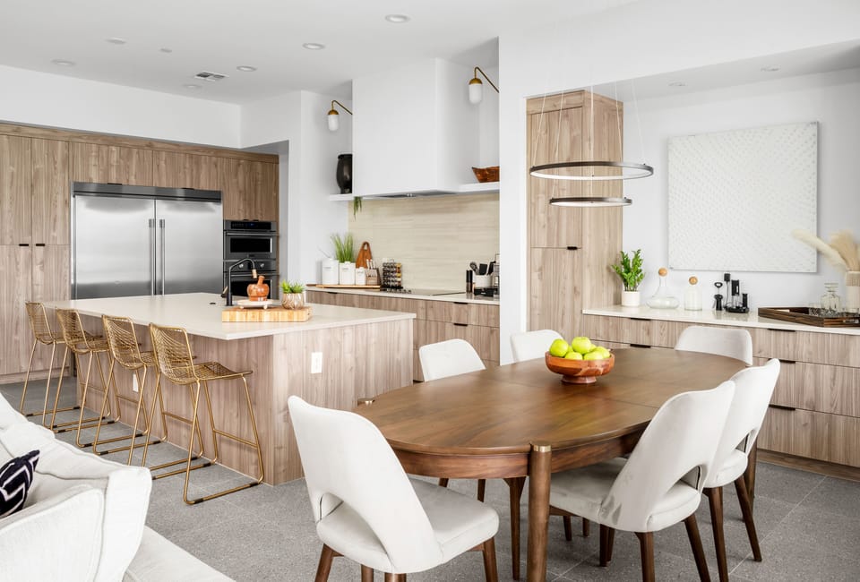 Modern kitchen w/ island seating, double fridge & dining space