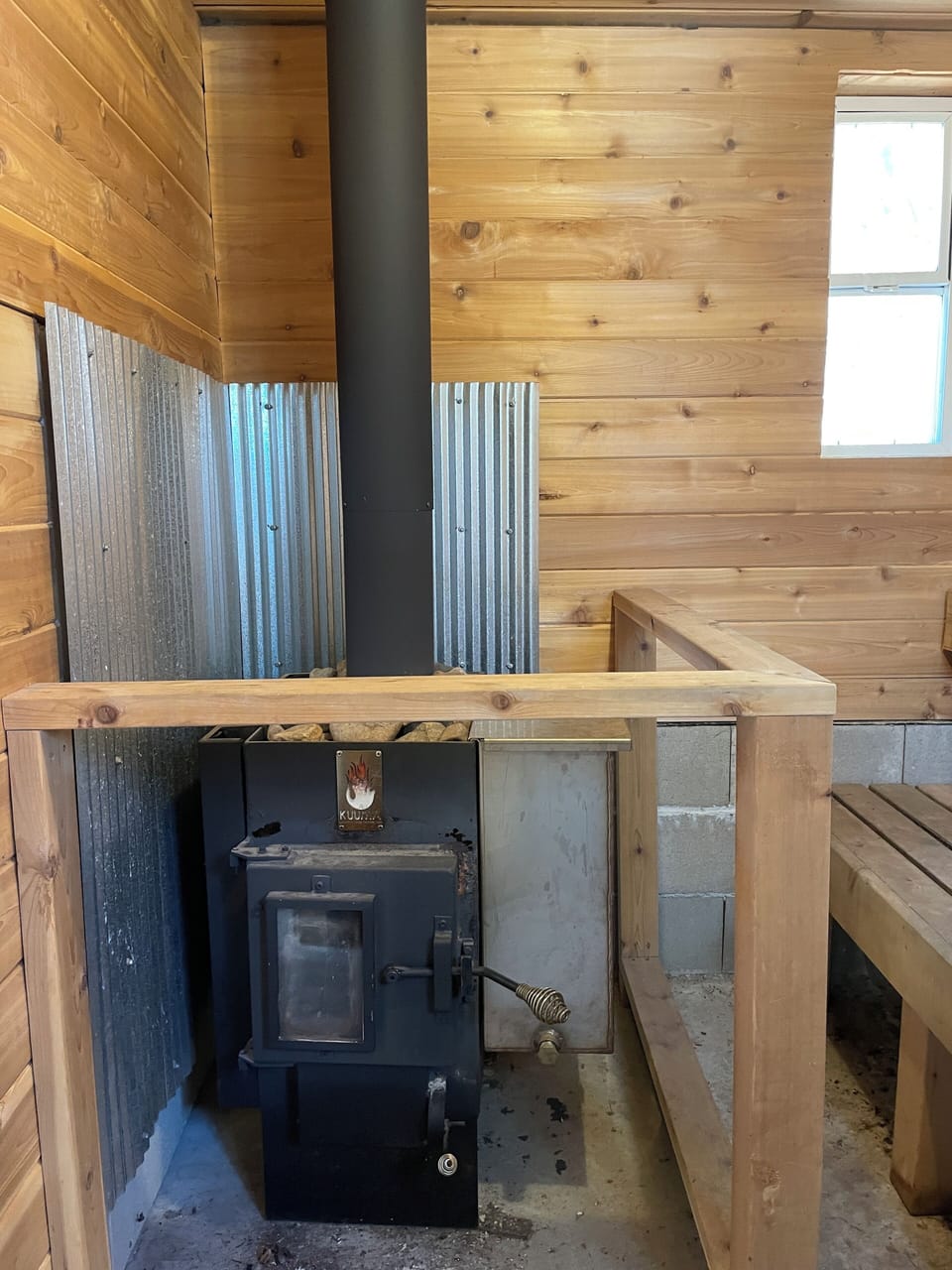 Wood burning sauna stove.