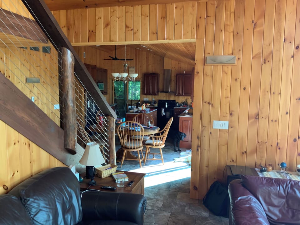 Dining area and bottom of staircase.