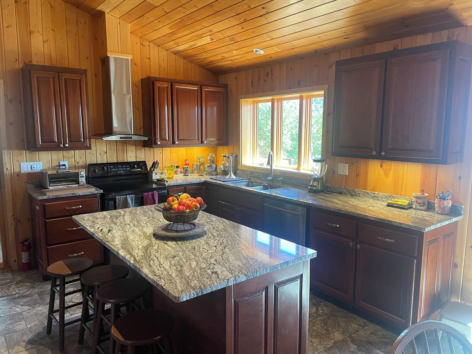 Lake and screen porch side of kitchen.