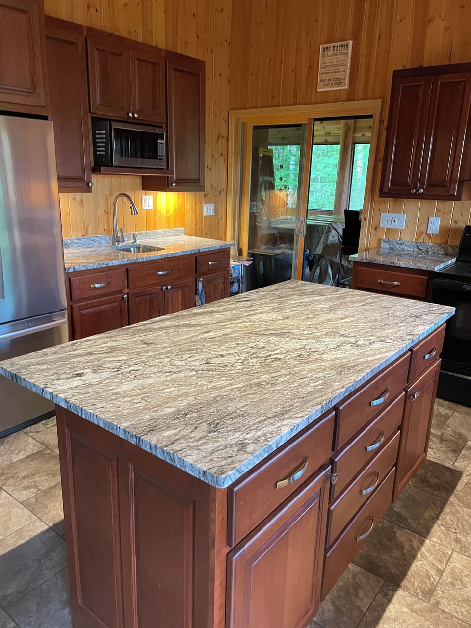 Kitchen island and breakfast bar.