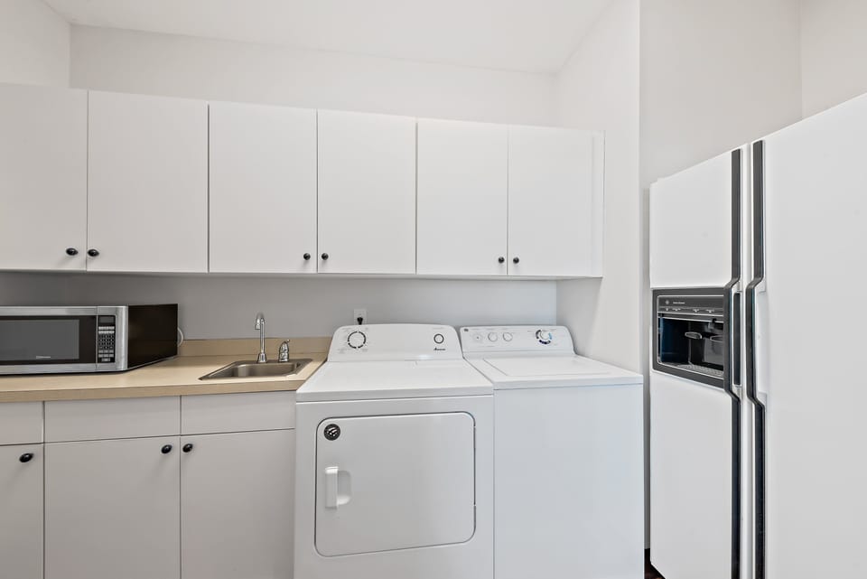 Laundry room with washer and dryer on the 1st floor