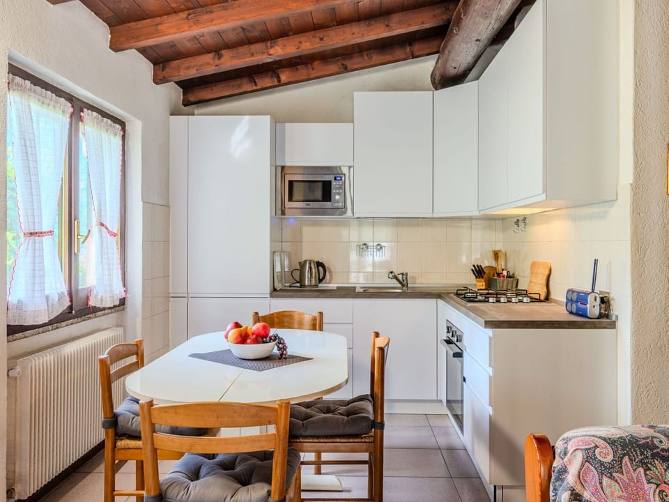 Furniture, Interior Design, Flooring, Kitchen, Countertop, Wood, Ceiling, Kitchen Appliance, Major Appliance, Floor