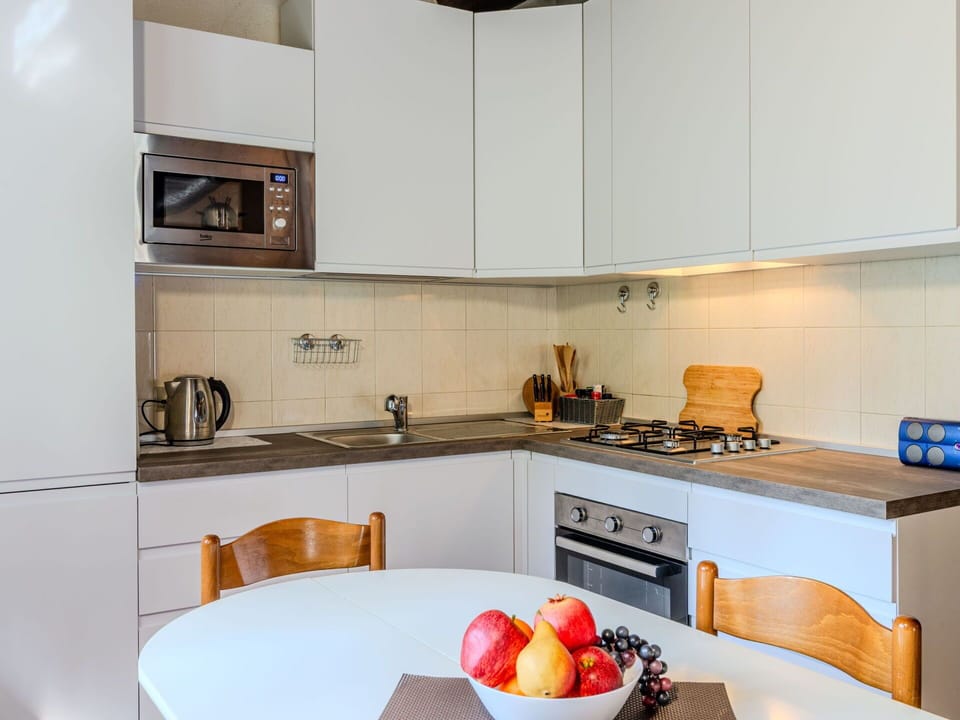 Kitchen Appliance, Kitchen, Countertop, Major Appliance, Cabinetry, Furniture, Interior Design, Kitchen Stove, Home Appliance, Stove
