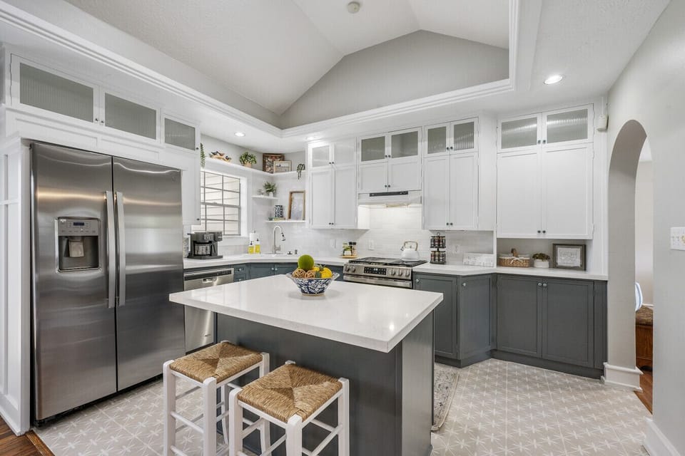 Fully stocked kitchen with island and gas range