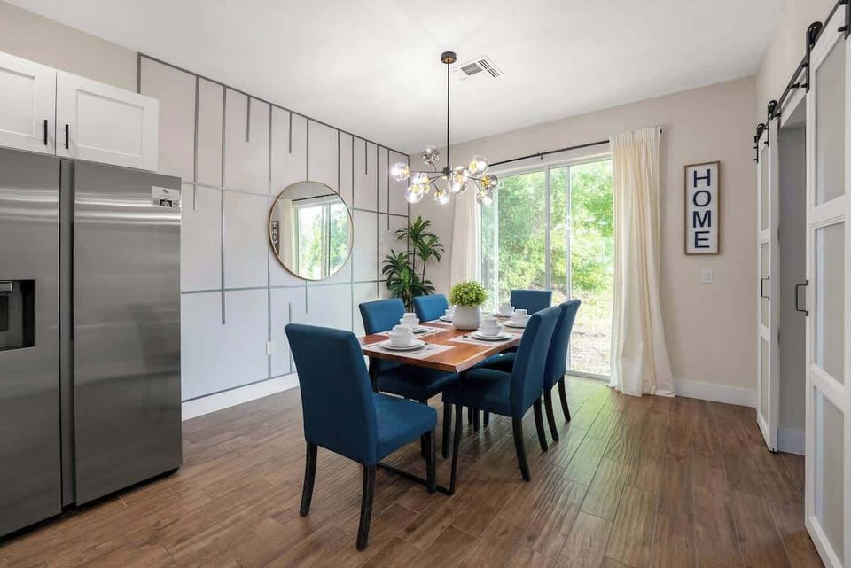 This lovely dining area connected to the kitchen offers 6 seats dining table and a beautiful view.