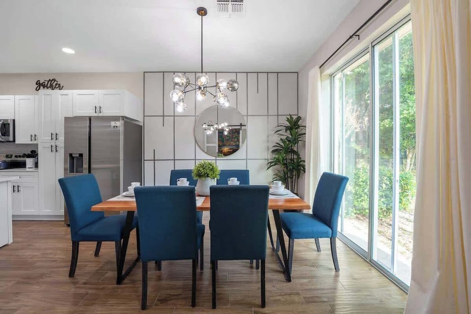 This lovely dining area connected to the kitchen offers 6 seats dining table and a beautiful view.