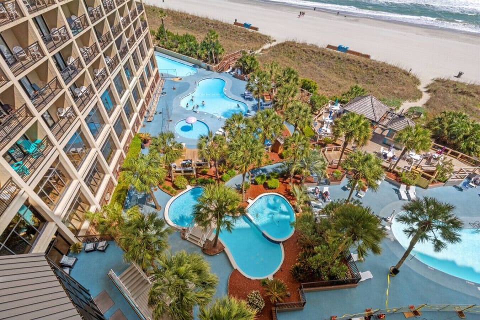Beach Cove`s tropically themed resort has a number of pools, hot tubs, lazy river, fountains, poolside beach bar and direct beach access.