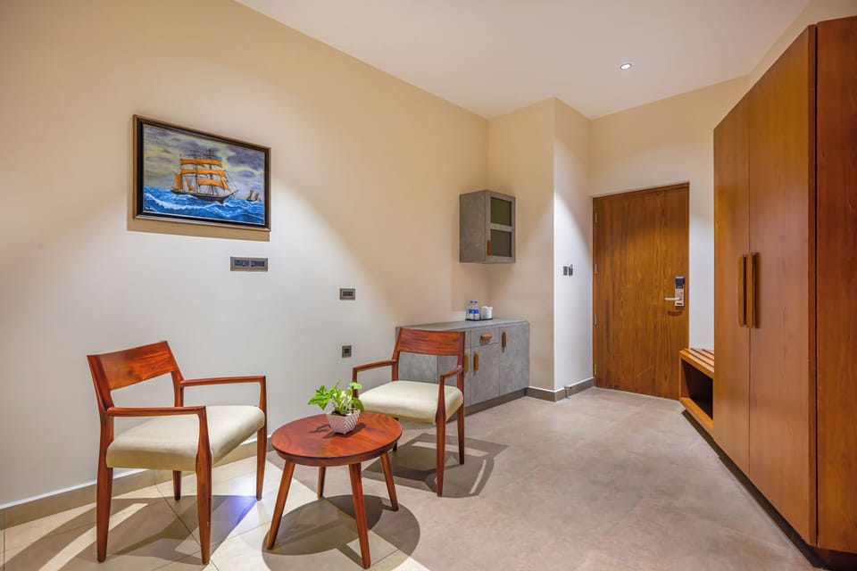 Basic Single Room, City View | Living area | TV
