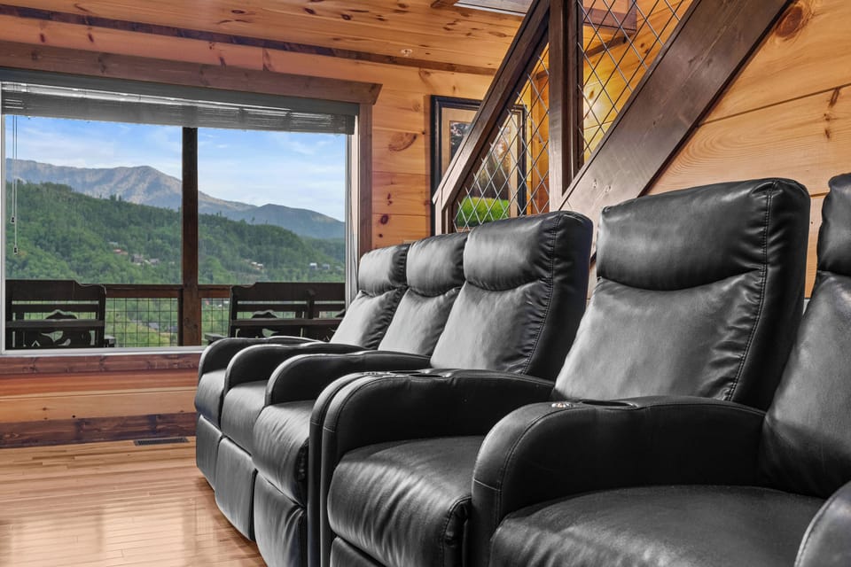 Theater room with comfy reclining seats!