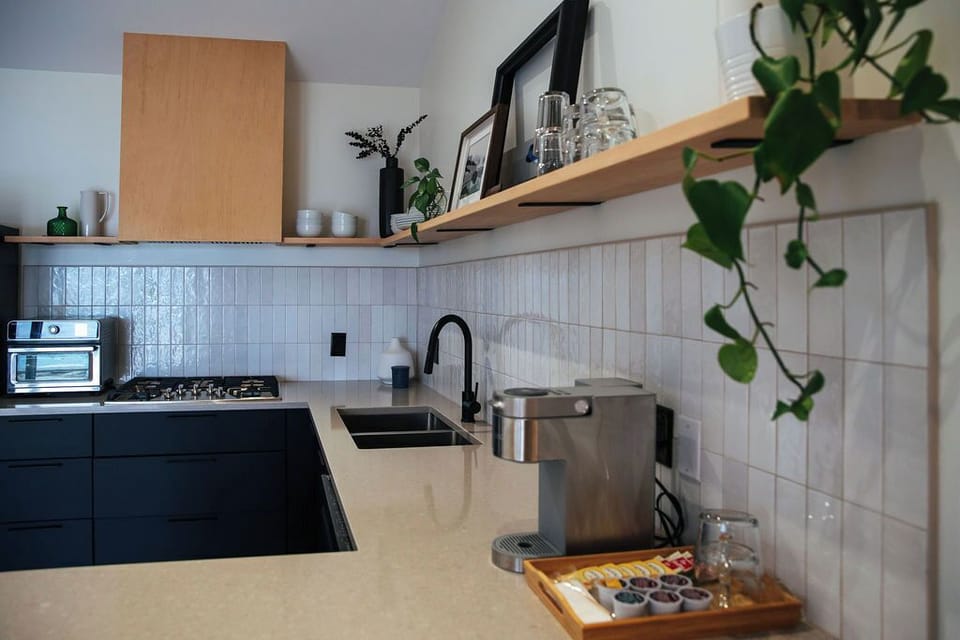 Kitchen with gas cooktop, toaster oven/air fryer unit & Kurig