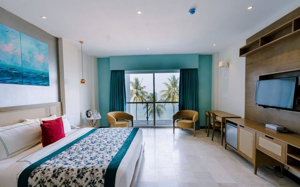 Deluxe Double or Twin Room, Balcony, Beach View | Desk, laptop workspace, free WiFi