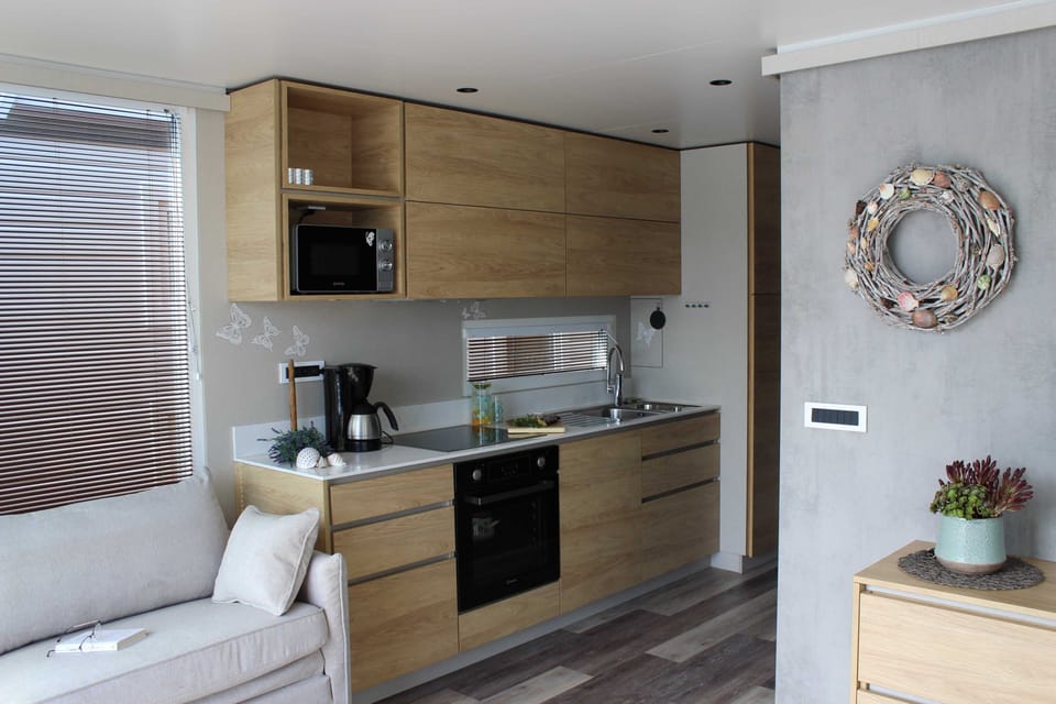 Apartment (Two Bedroom Floating House) | Private kitchen | Fridge