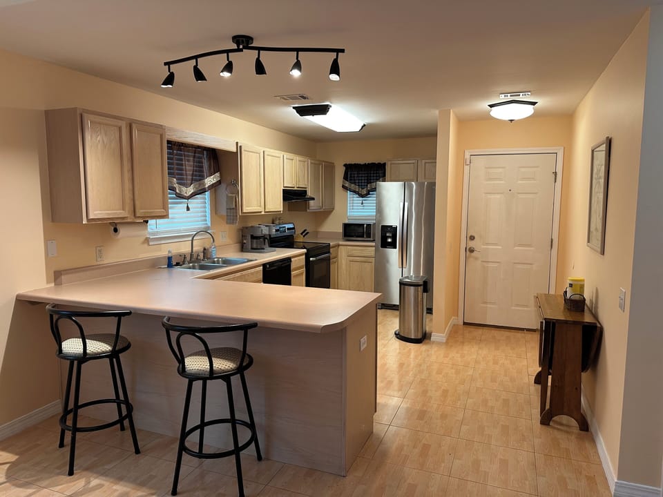 Kitchen with Keurig dual for pods and a pot of coffee.
