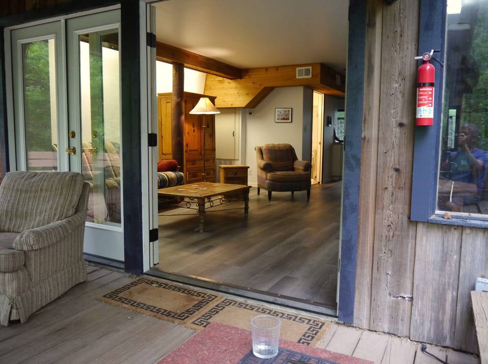 Large French doors from the back deck to the living room
