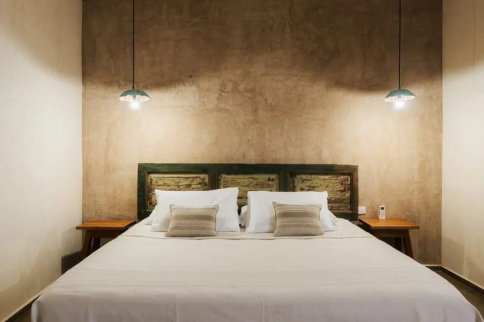 Deluxe Room, Patio, Courtyard View | Egyptian cotton sheets, premium bedding, down comforters
