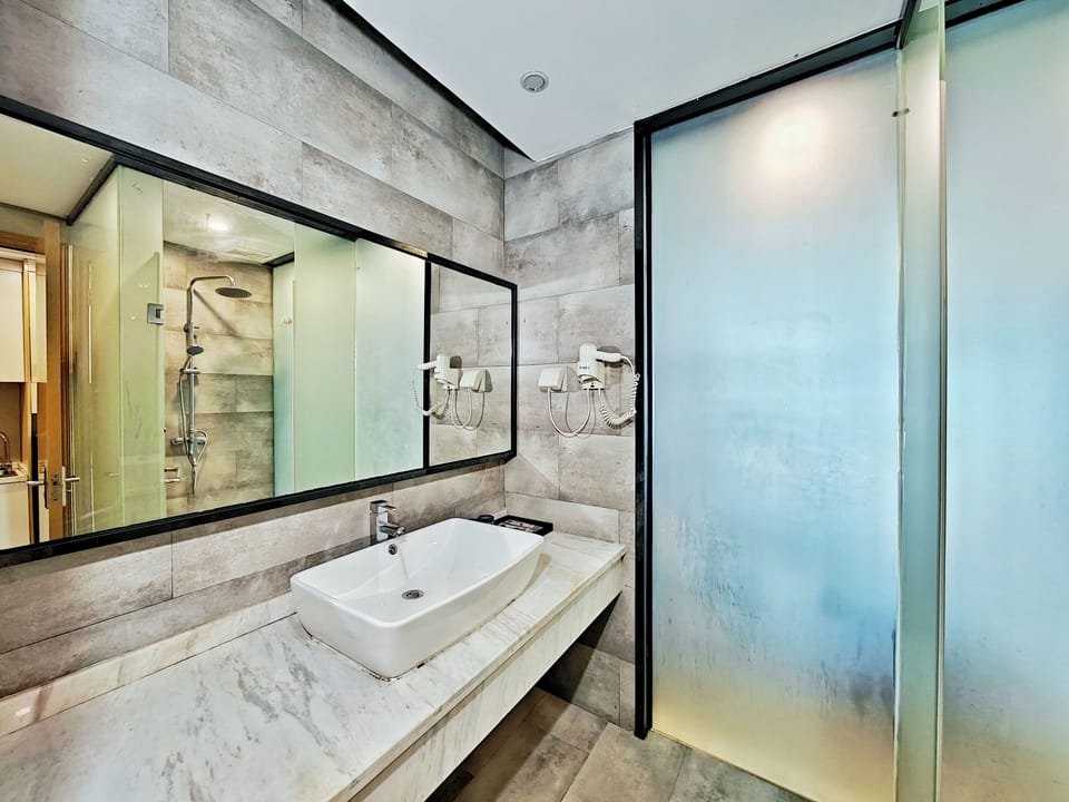 Comfort Room | Bathroom | Free toiletries, hair dryer, slippers, towels