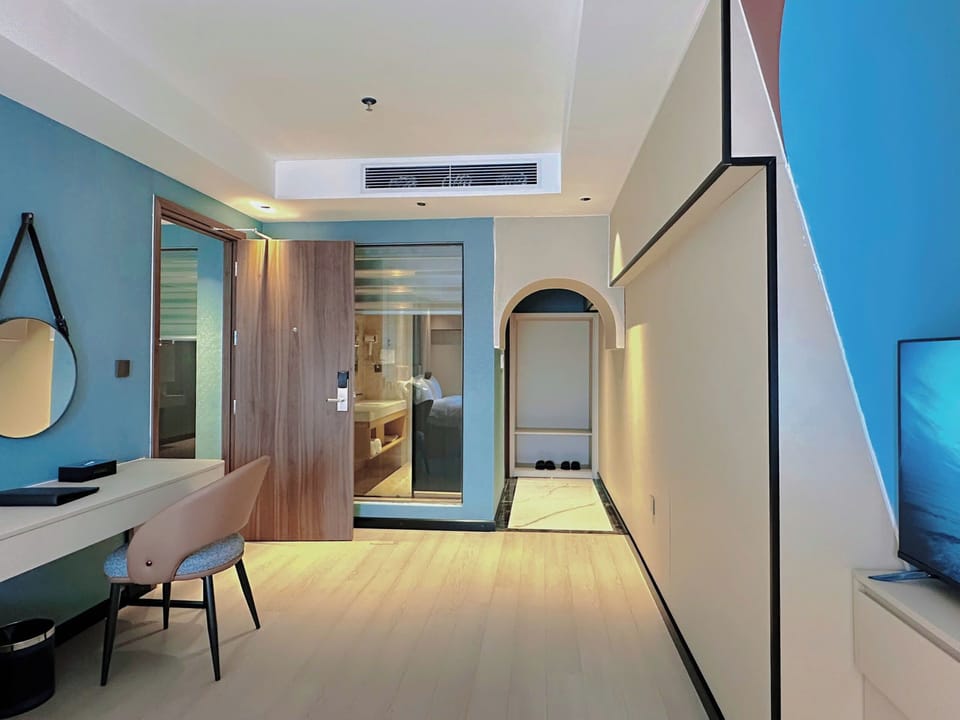 Family Quadruple Room, Balcony, City View | Minibar, desk, laptop workspace, free WiFi