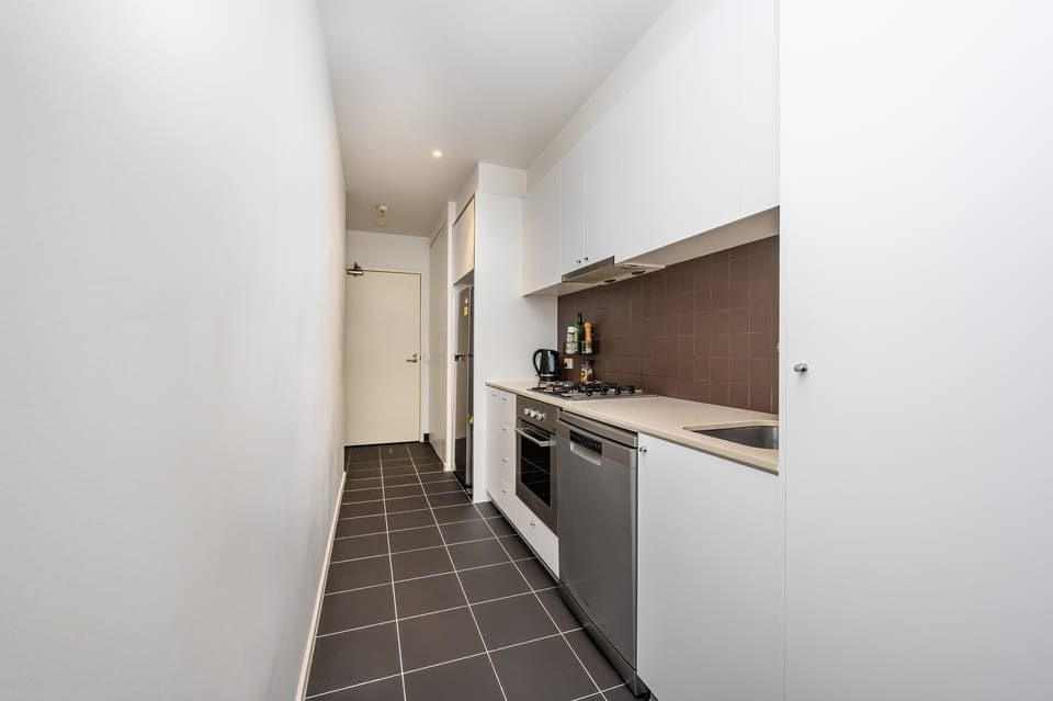 Galley style kitchen and Euro style laundry off entrance hallway