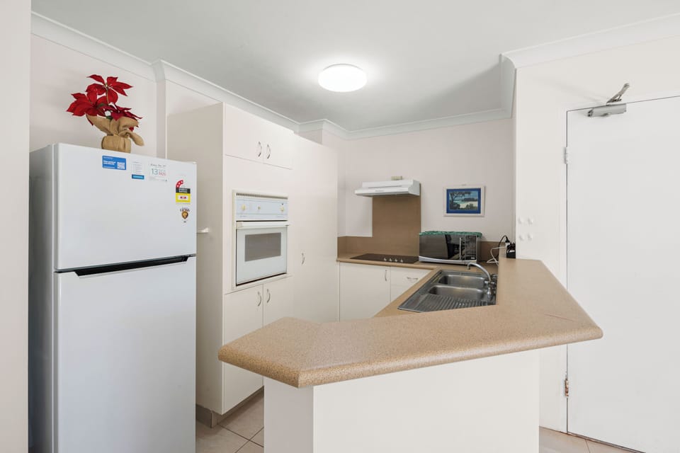 Apartment, 2 Bedrooms, Balcony, Garden View | Private kitchen | Coffee/tea maker, electric kettle, toaster, cleaning supplies
